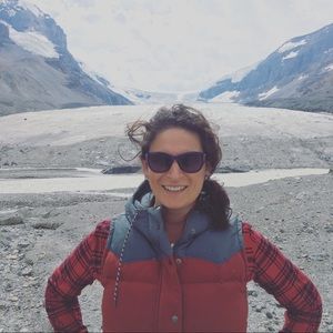 Patagonia bivy vest in oxblood and gray with mushroom lining.